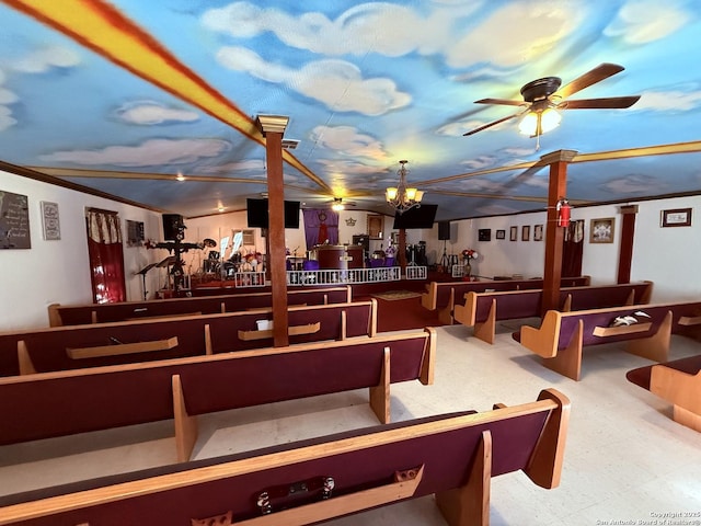 interior space featuring bar and ceiling fan with notable chandelier