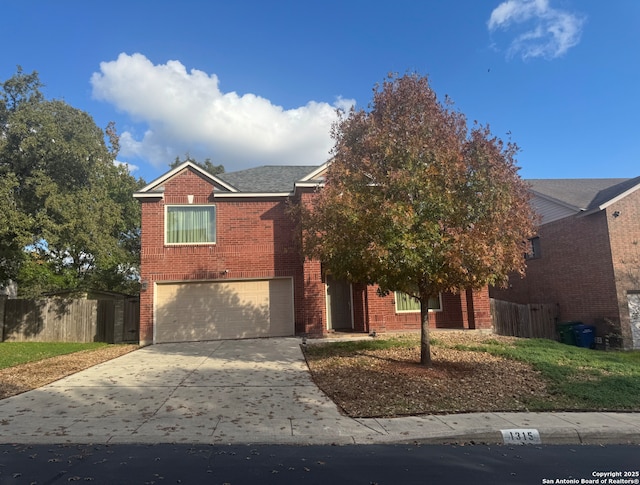 view of front of property with a garage