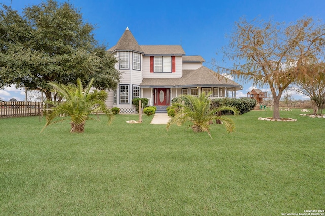 victorian house with a front yard