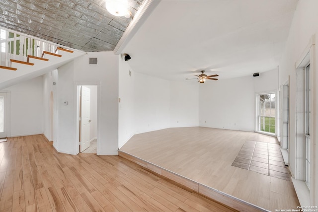 interior space featuring light wood-type flooring and ceiling fan