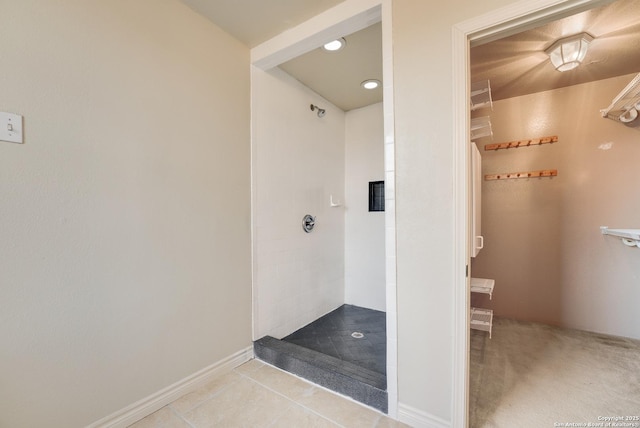 bathroom featuring tile patterned floors and walk in shower