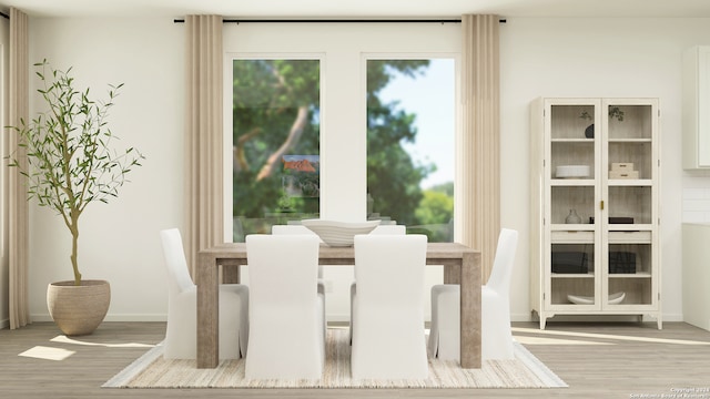 dining area featuring wood-type flooring