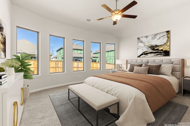 bedroom with ceiling fan and carpet flooring