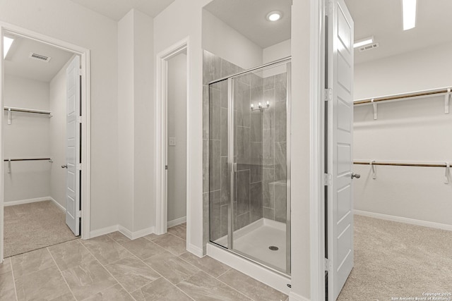 bathroom featuring walk in shower