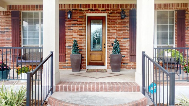 entrance to property with covered porch