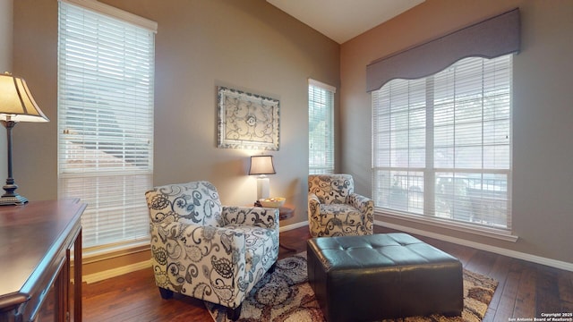 sitting room with dark hardwood / wood-style floors