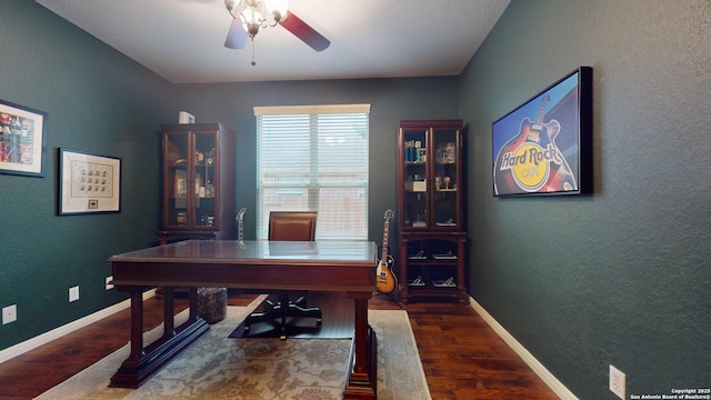 office area featuring ceiling fan and dark wood-type flooring