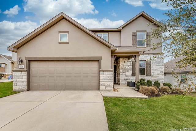 view of front property with a front lawn and a garage