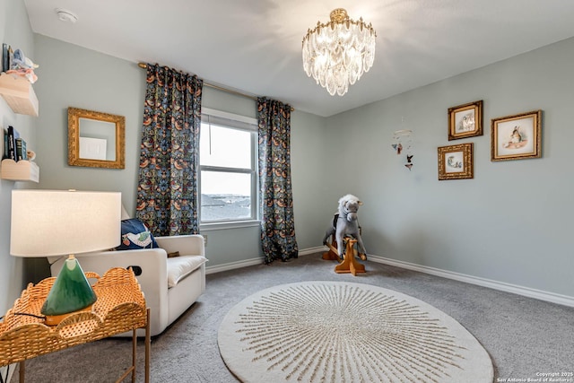 living area featuring a notable chandelier and light carpet