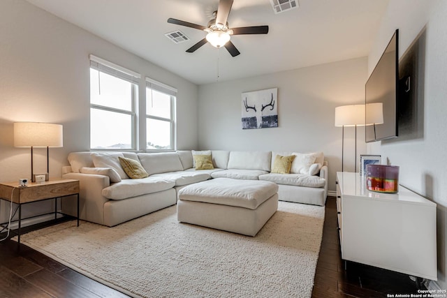 living room featuring ceiling fan