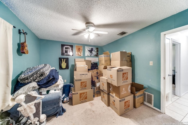 storage room with ceiling fan