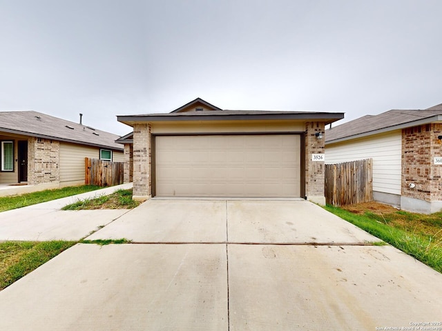 single story home with a garage