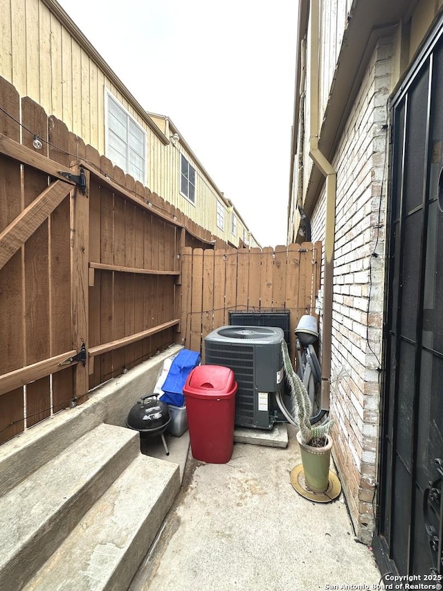 view of patio / terrace featuring cooling unit