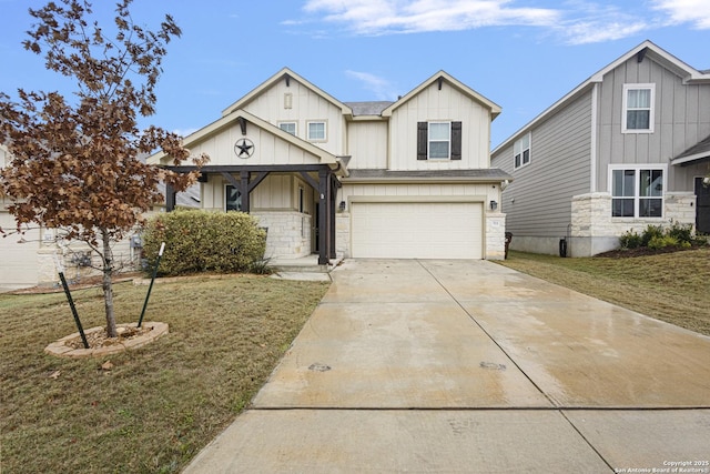 view of front of house with a front yard and a garage