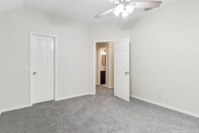 unfurnished bedroom featuring ceiling fan and carpet