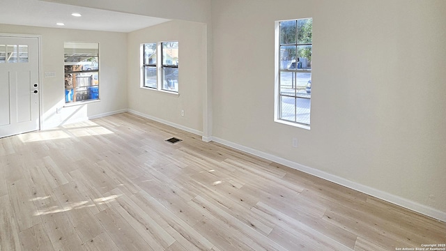 foyer with light hardwood / wood-style flooring