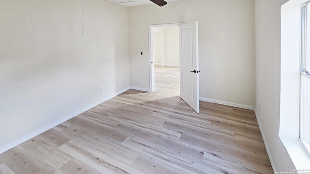 spare room featuring light hardwood / wood-style floors