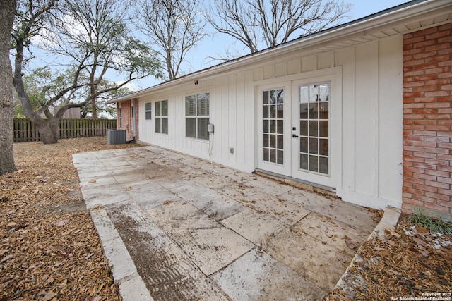 view of patio featuring cooling unit and french doors