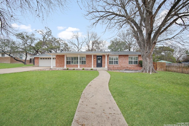 single story home with a garage and a front yard