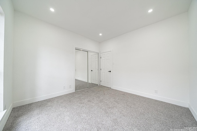 spare room featuring carpet flooring