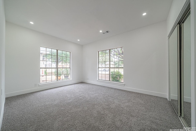 unfurnished bedroom featuring carpet flooring