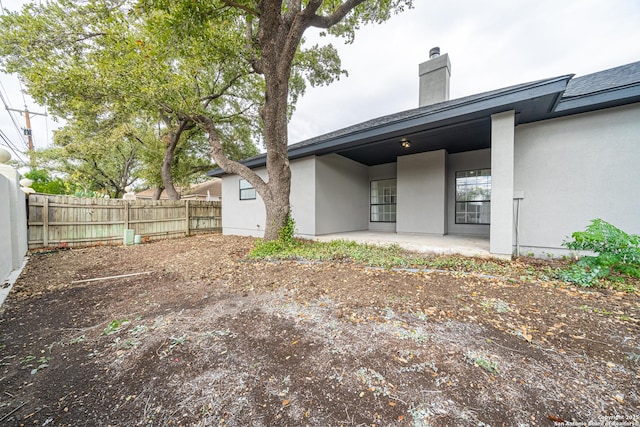 back of house featuring a patio area