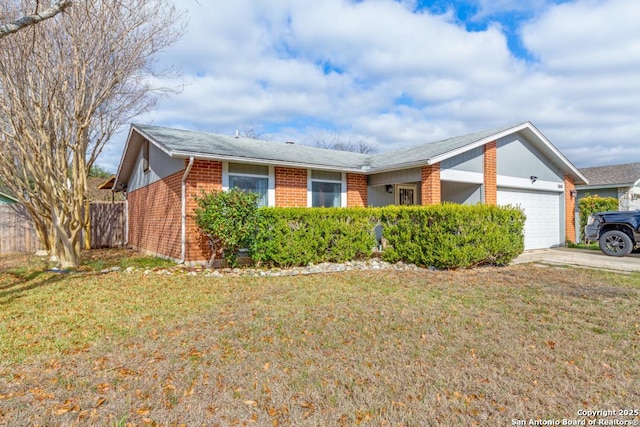 ranch-style house with a garage and a front lawn