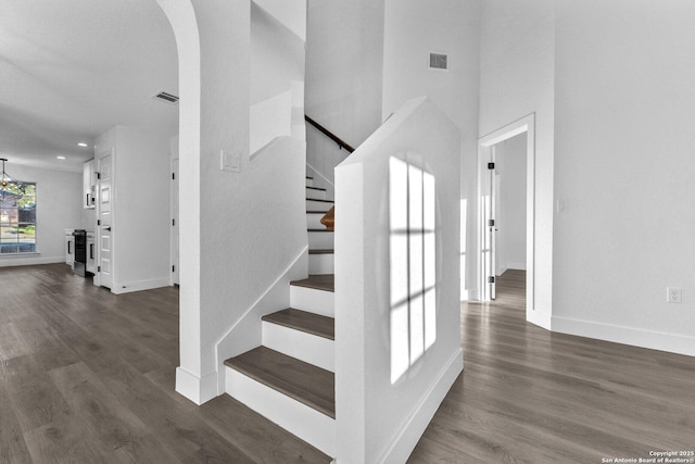 stairway with wood-type flooring