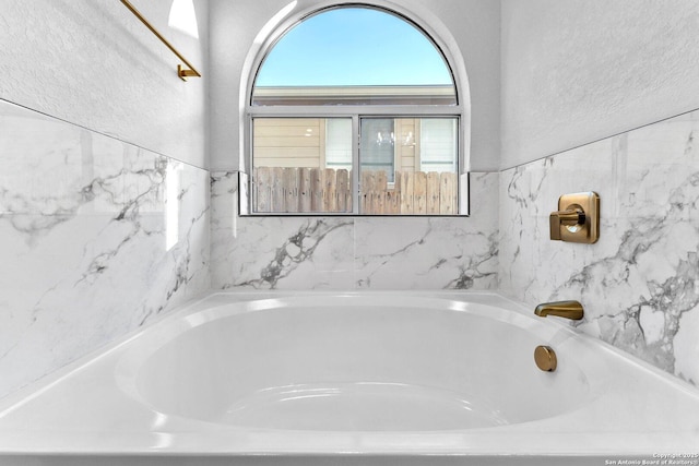 bathroom with a bathtub