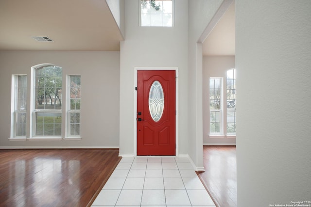 entryway featuring light tile patterned flooring