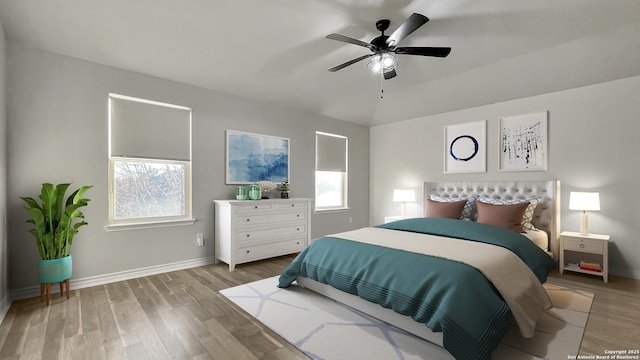 bedroom with vaulted ceiling, light hardwood / wood-style flooring, and ceiling fan