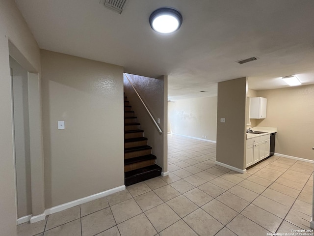 interior space featuring light tile patterned floors