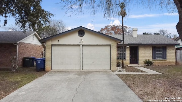 ranch-style home with a garage