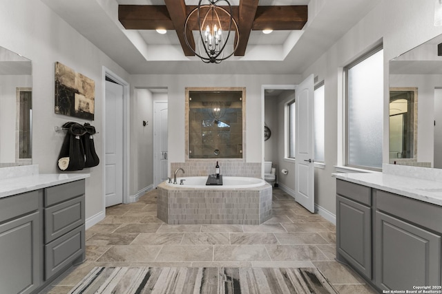 full bathroom with coffered ceiling, beamed ceiling, separate shower and tub, a chandelier, and toilet