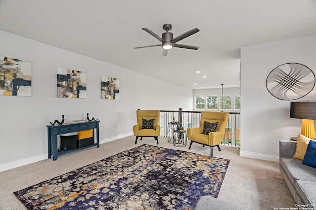 sitting room with carpet flooring and ceiling fan