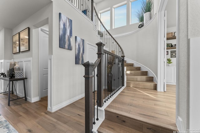 staircase featuring hardwood / wood-style flooring