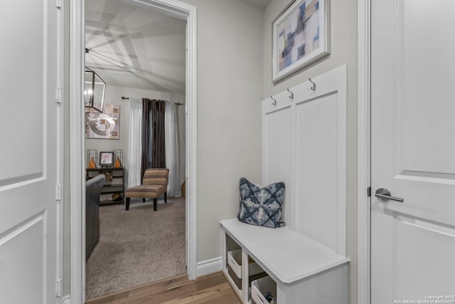 mudroom with light hardwood / wood-style flooring