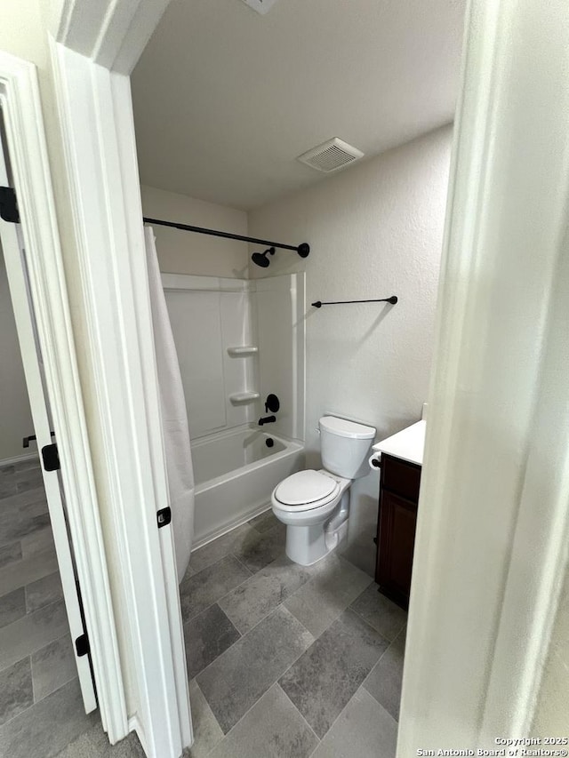 full bathroom featuring vanity, toilet, and shower / tub combo with curtain