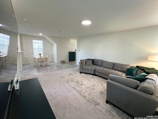 living room featuring light carpet