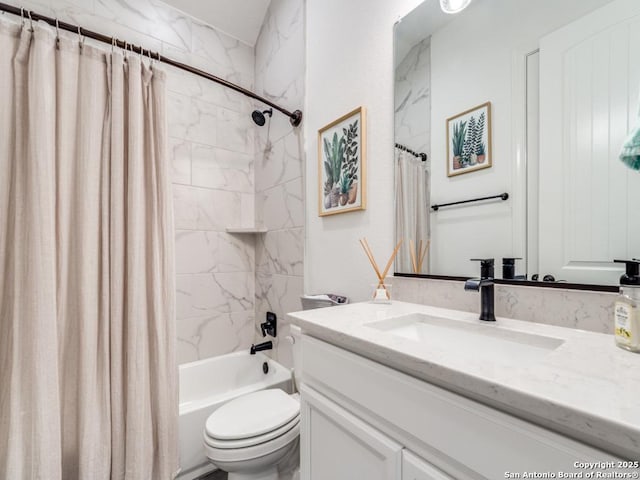 full bathroom with shower / tub combo with curtain, vanity, and toilet