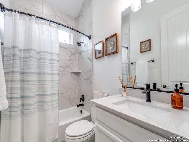 full bathroom featuring vanity, shower / bath combo, and toilet