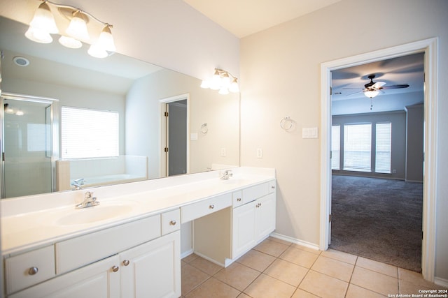 bathroom featuring shower with separate bathtub, vanity, tile patterned floors, and ceiling fan