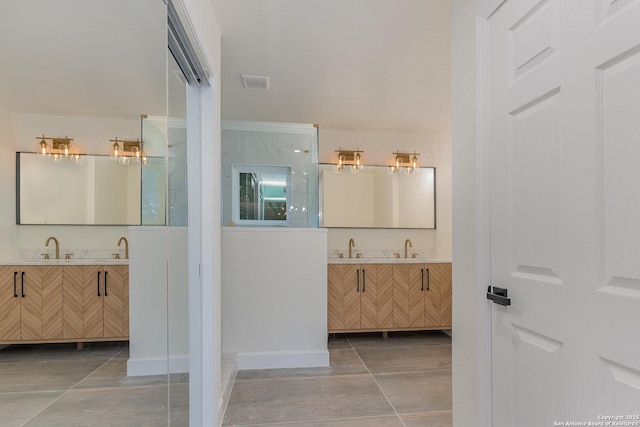 bathroom featuring vanity and tile patterned floors