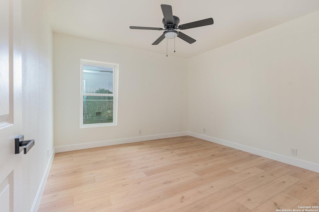 unfurnished room featuring ceiling fan and light hardwood / wood-style flooring