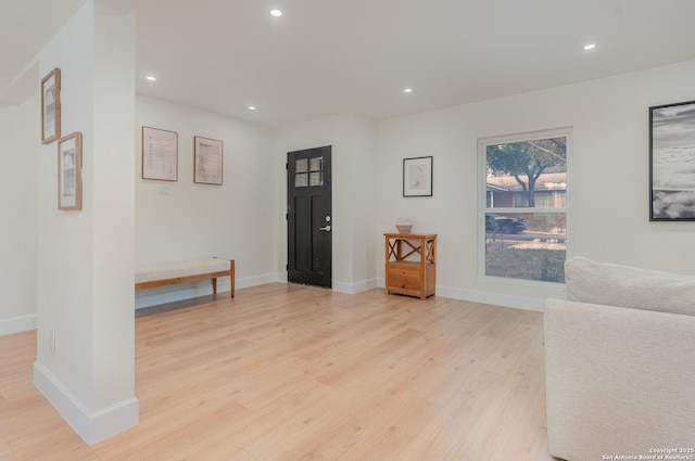 foyer with light wood-type flooring