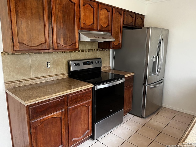 kitchen with stainless steel appliances, tasteful backsplash, crown molding, and light tile patterned flooring