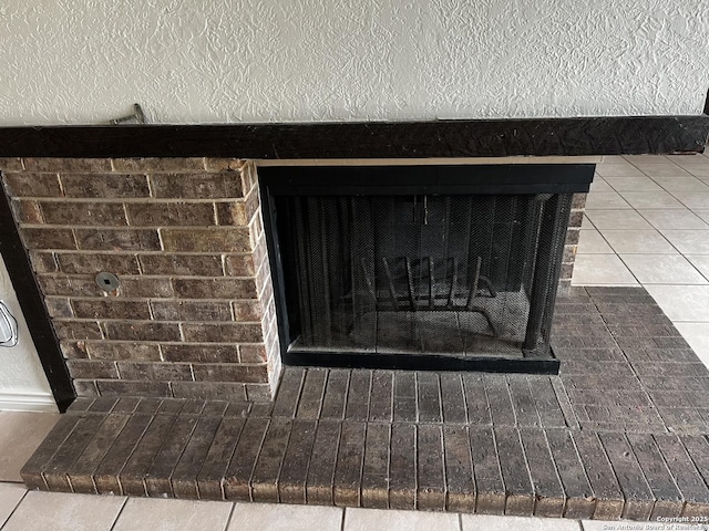 room details featuring a brick fireplace