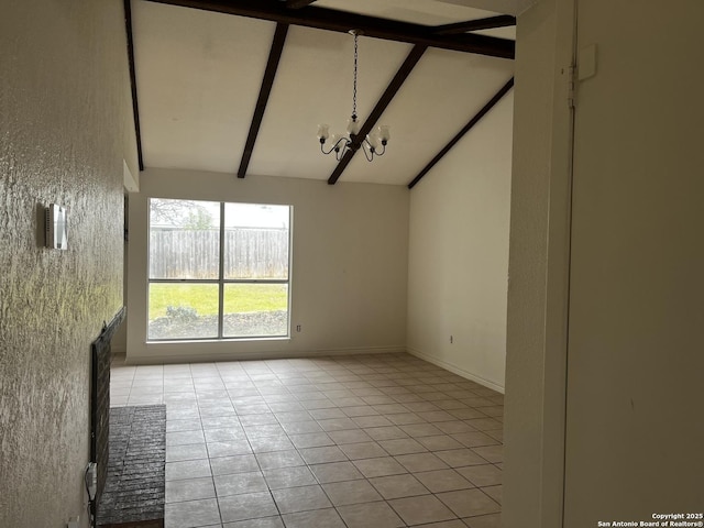 empty room featuring beam ceiling, light tile patterned floors, high vaulted ceiling, and an inviting chandelier