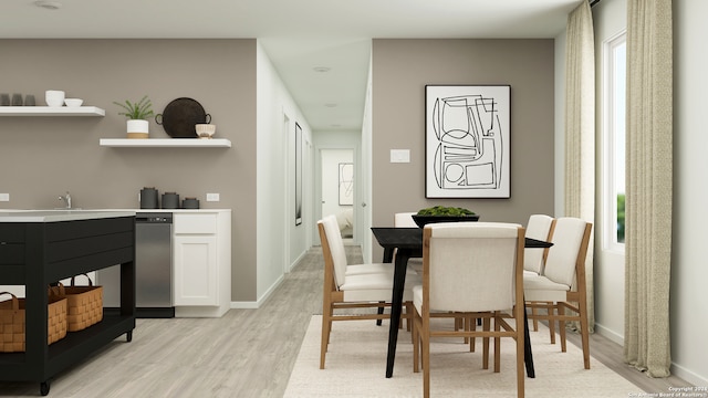 dining space featuring light hardwood / wood-style flooring