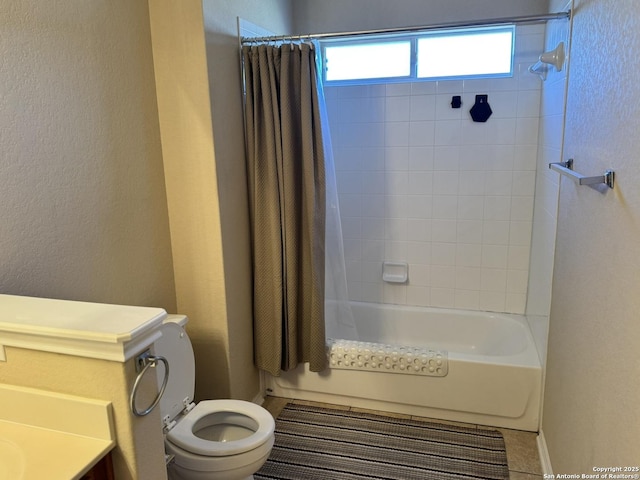 bathroom with tile patterned floors, toilet, and shower / tub combo with curtain